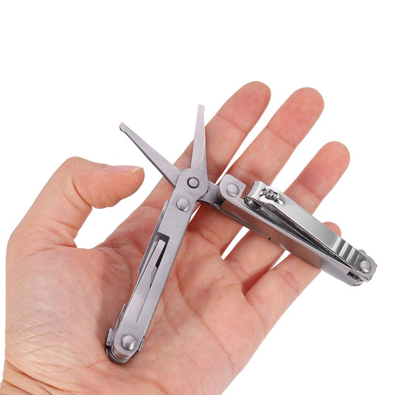 Mini-Multifunctional-Nail-Cleaning-Tool-Set-with-Screwdriver-Cutter-Bottle-Opener-1229392